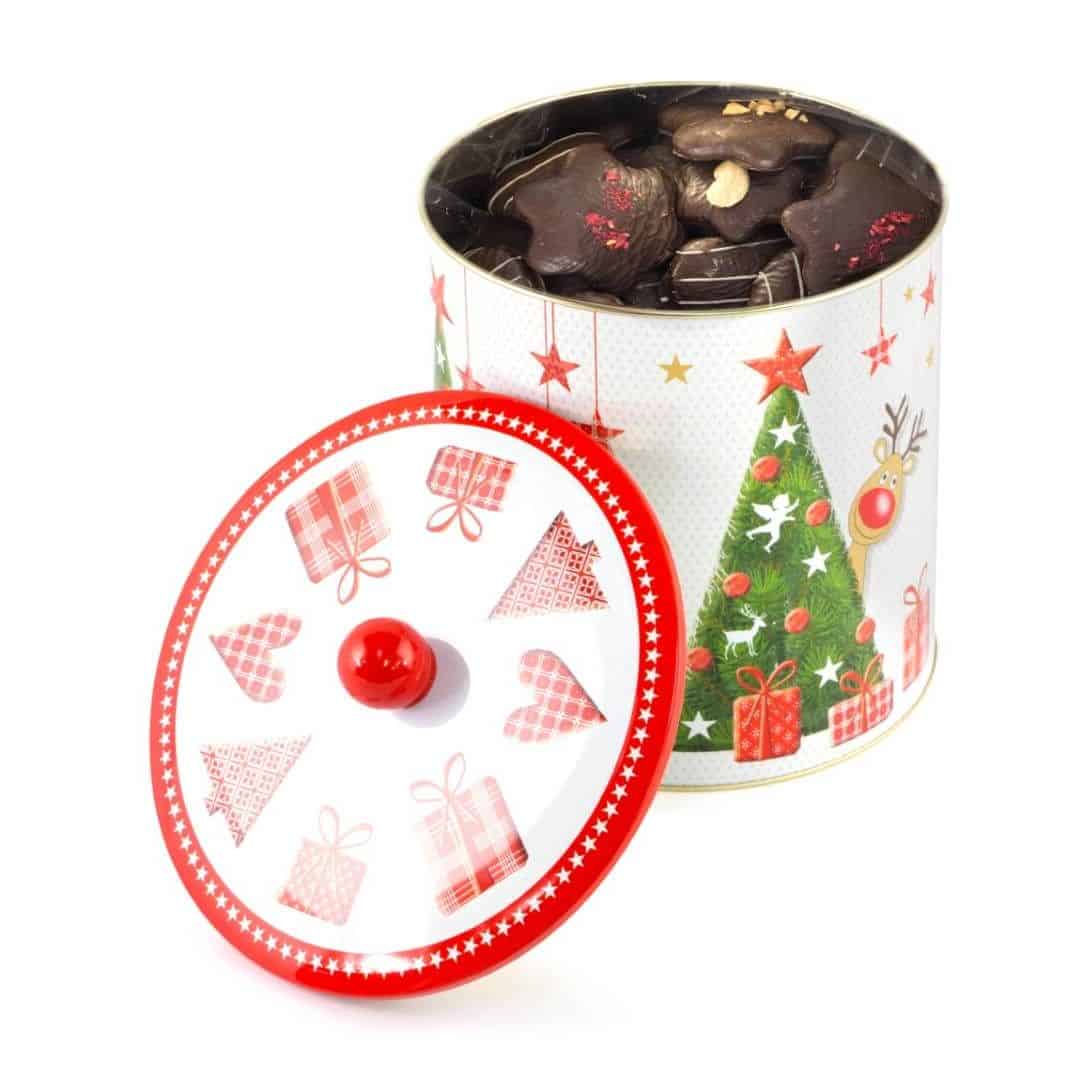 Puszka "Rudolf" Puszka z dekorowanymi piernikami w czekoladzie deserowej z malinami, migdałami i białą czekoladą.